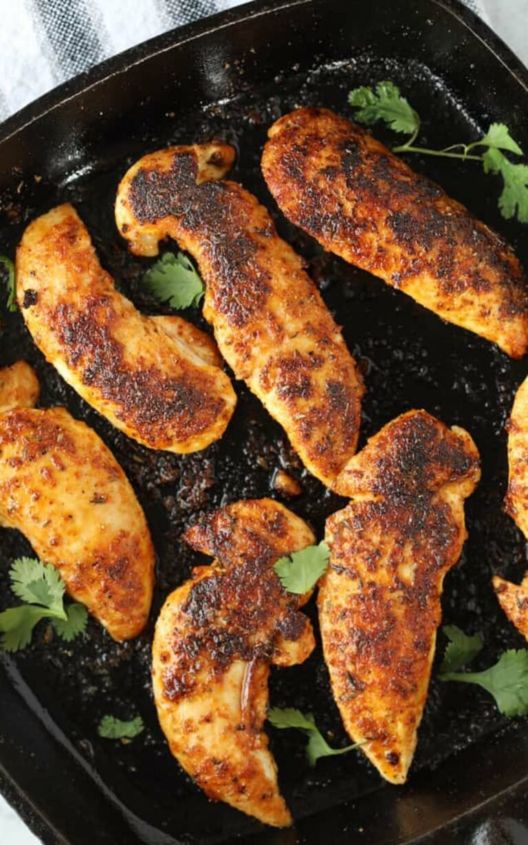 Blackened Chicken Tenders in a black grilling plate.