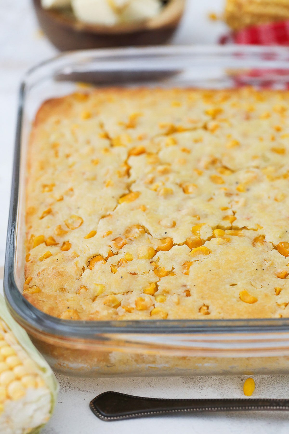 Cornbread casserole served in a casserole dish.