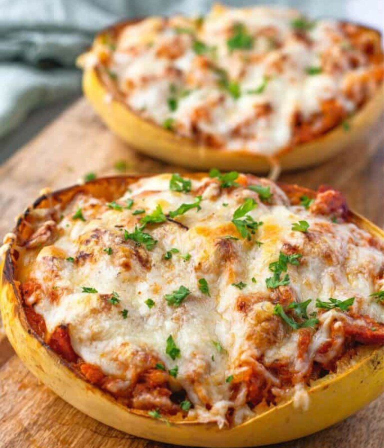 Italian Stuffed Spaghetti Squash on a wooden board.