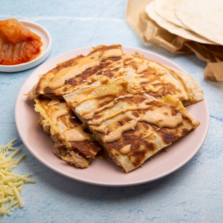 Kimchi Tuna Melt Quesadilla on a pink plate.