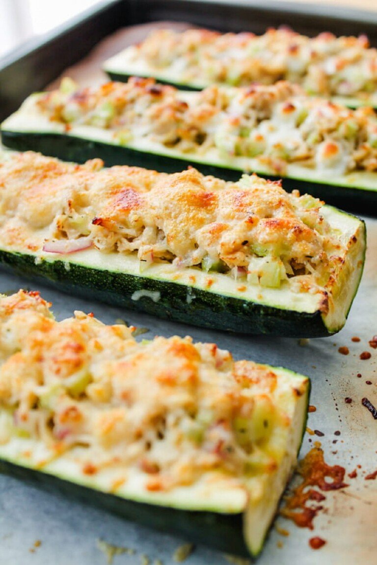 Stuffed Zucchini Boats on a baking tray.