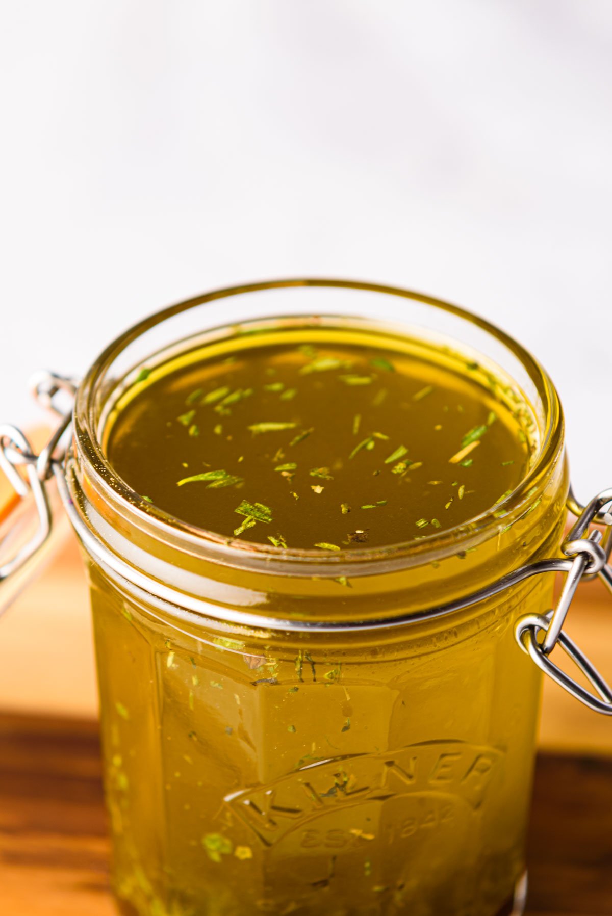 a glass jar filled with the completed turkey marinade