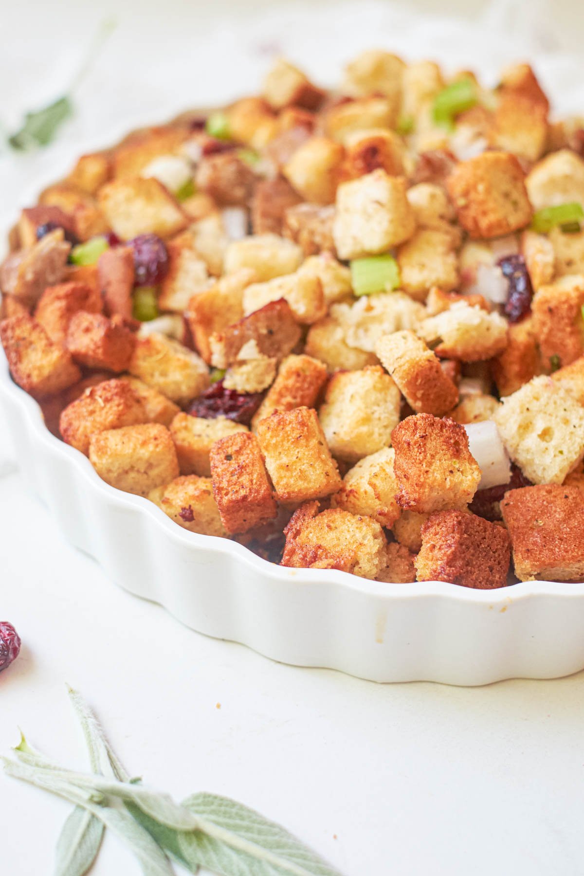 the finished air fryer stuffing in a white baking dish