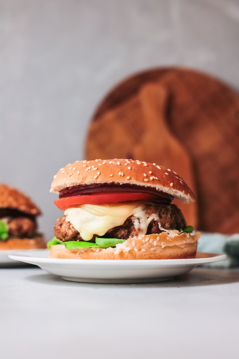 the completed air fryer turkey burgers recipe served on white plates