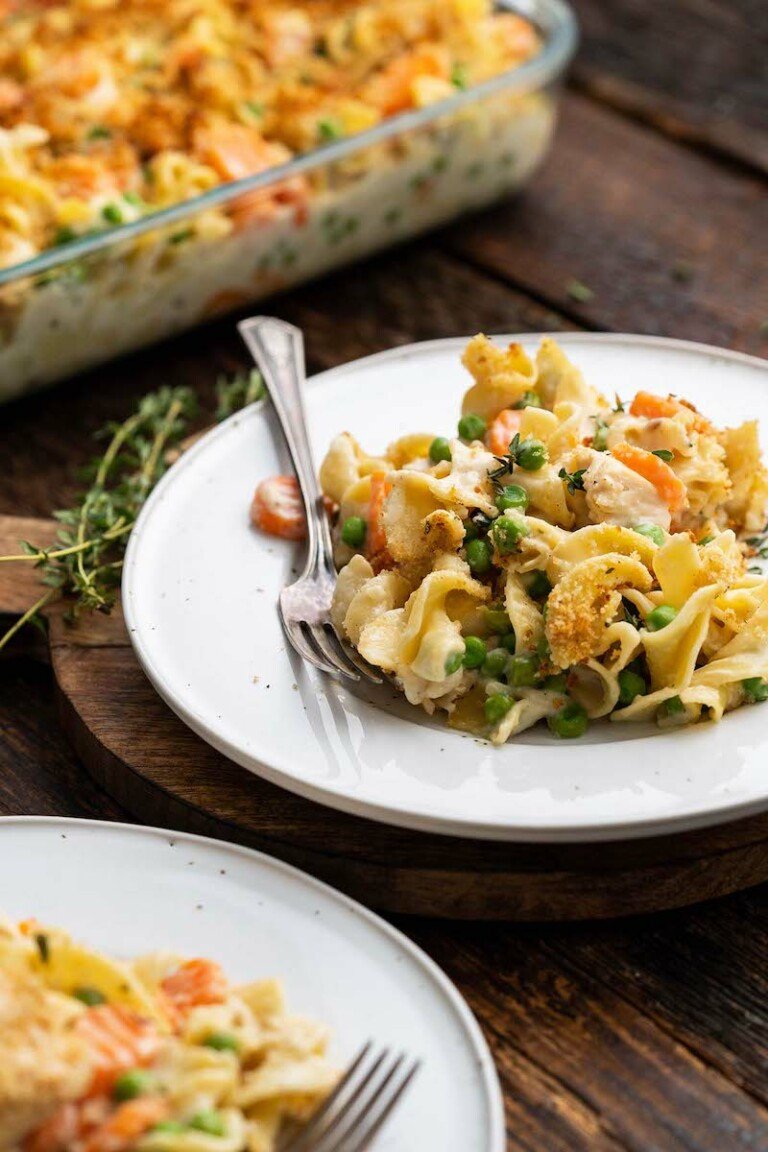 a plate of chicken noodle casserole with a fork