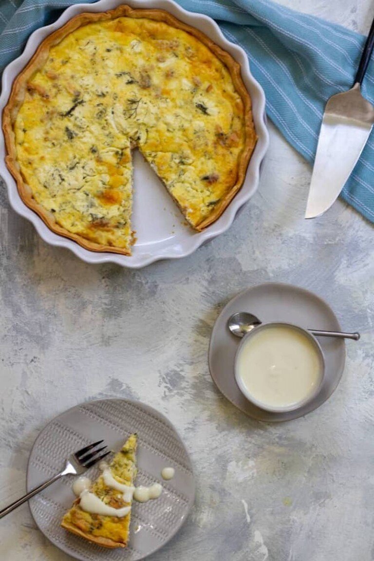 top down view of the finished salmon quiche with a slice removed