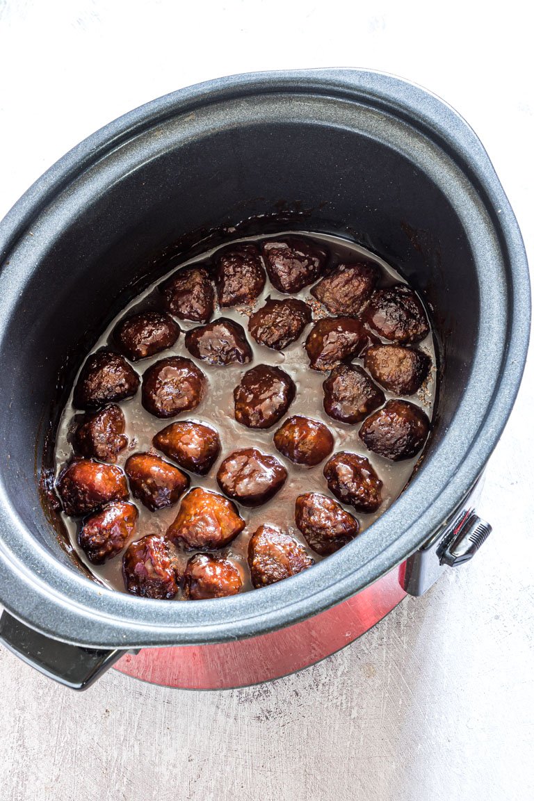 completed slow cooker meatballs inside a crockpot and ready to serve