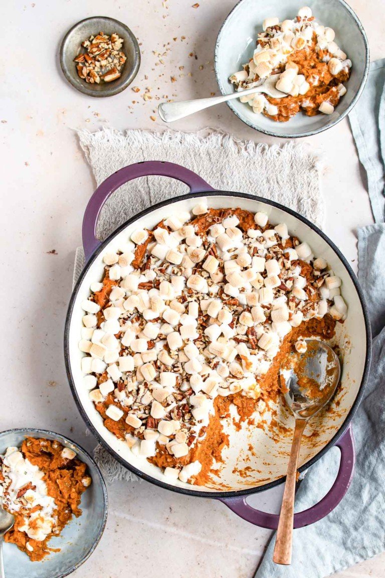 top down view of the finished sweet potato casserole with a serving removed